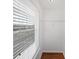 Bright walk-in closet with wooden floors and wire shelving at 1536 Softshell St, St Cloud, FL 34771