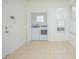 Functional laundry area with washer and dryer hookups and window at 1660 Mountclair Ct, Mount Dora, FL 32757