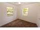 Bright bedroom with natural light with carpet flooring and a ceiling fan at 1801 Riley Ave, Orlando, FL 32805