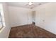 Cozy bedroom with carpet flooring, natural light and a ceiling fan at 1801 Riley Ave, Orlando, FL 32805