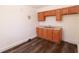 Kitchen featuring wooden cabinets and sleek countertops at 1801 Riley Ave, Orlando, FL 32805