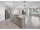 Modern kitchen with stainless steel appliances, granite countertops, and island at 1925 Arbor Mill Ln, Kissimmee, FL 34744