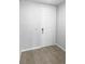 Entryway featuring beige tile flooring, a white door, and light gray walls at 2033 Milkweed St, Ocoee, FL 34761