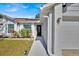 Close up of the house showcasing the front door, window and the front yard at 211 Dalton Dr, Kissimmee, FL 34758