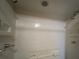 This updated shower features two shower heads, tiled walls, and built-in shelves at 2626 Balkan St, Apopka, FL 32703