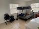 Bedroom featuring a bunk bed and neutral decor at 2761 L B Mcleod Rd # A, Orlando, FL 32805