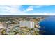 Stunning aerial view of a waterfront condo building with private docks and panoramic water views at 2801 S Ridgewood Ave # 1412, South Daytona, FL 32119