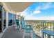 Spacious balcony with outdoor seating and panoramic views at 2801 S Ridgewood Ave # 1412, South Daytona, FL 32119