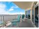 Relaxing balcony with seating, perfect for enjoying waterfront views at 2801 S Ridgewood Ave # 1412, South Daytona, FL 32119