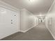 Hallway leading to apartment entrance at 2801 S Ridgewood Ave # 1412, South Daytona, FL 32119