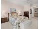 Comfortable main bedroom with plush carpet, light pink walls, and a serene, beach-inspired aesthetic at 2801 S Ridgewood Ave # 1412, South Daytona, FL 32119