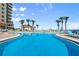 Large, sparkling pool with plenty of lounge chairs for residents at 2801 S Ridgewood Ave # 1412, South Daytona, FL 32119