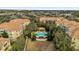 Aerial view of the community featuring a pool, landscaping and residential buildings at 3338 Robert Trent Jones Dr # 20804, Orlando, FL 32835