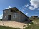 Rear exterior of a house under construction, showcasing the yard and exterior at 336 Caladium Ave, Lake Alfred, FL 33850