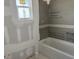 Unfinished bathroom with a bathtub at 336 Caladium Ave, Lake Alfred, FL 33850