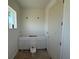 Bathroom vanity awaiting fixtures, boasting a clean, modern design and ample storage beneath the counter space at 336 Caladium Ave, Lake Alfred, FL 33850