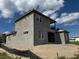 Two-story exterior featuring modern window design and stucco exterior at 336 Caladium Ave, Lake Alfred, FL 33850