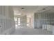 Unfinished living room with doors to the outside at 336 Caladium Ave, Lake Alfred, FL 33850