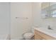 This bathroom has a toilet, vanity and shower at 414 Tranquille Oaks Dr, Ocoee, FL 34761