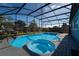 Inviting pool with an attached hot tub, perfect for relaxation and entertainment at 4523 Saddle Creek Pl, Orlando, FL 32829