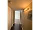 Hallway featuring wood floors and access to other rooms at 516 Orange Dr # 17, Altamonte Springs, FL 32701