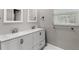 Bathroom with double vanity, modern sinks and faucet fixtures at 533 Little Wekiva Rd, Altamonte Springs, FL 32714