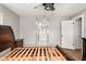 Bedroom featuring a ceiling fan and a view into the bathroom at 533 Little Wekiva Rd, Altamonte Springs, FL 32714