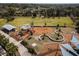 Aerial view of a playground featuring modern equipment, shaded seating, and lush landscaping, creating a Gathering-friendly environment at 533 Little Wekiva Rd, Altamonte Springs, FL 32714