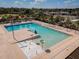 Aerial view of a large, inviting swimming pool with a splash pad and ample deck space, perfect for summer fun at 533 Little Wekiva Rd, Altamonte Springs, FL 32714