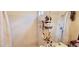 Functional bathroom with a shower/tub combination and storage at 5436 Bayberry Homes Rd, Orlando, FL 32811