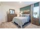 Comfortable bedroom features stylish furniture, soft carpet, and bright natural light at 560 Newton Rd, Port Orange, FL 32127