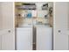 Laundry closet featuring a washer and dryer at 5795 Parkview Lake Dr, Orlando, FL 32821