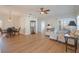 Bright living room featuring wood floors, neutral walls, and comfortable seating at 5795 Parkview Lake Dr, Orlando, FL 32821