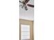 Bedroom features a ceiling fan, neutral paint, and a window for natural light at 6912 Hochad Dr, Orlando, FL 32819