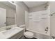 Bathroom featuring a shower and bath combo, single sink, and wood-look flooring at 812 Oleander St, New Smyrna Beach, FL 32168