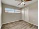 Bedroom featuring a window, closet, and neutral walls and flooring at 812 Oleander St, New Smyrna Beach, FL 32168