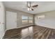 Inviting living room featuring stylish wood floors, neutral paint, and ample natural light at 812 Oleander St, New Smyrna Beach, FL 32168