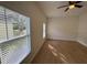 Well lit bedroom featuring two windows and wood floors at 950 20Th St, Orlando, FL 32805