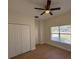 Bedroom featuring a closet, ceiling fan, and natural light at 950 20Th St, Orlando, FL 32805