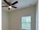 Bedroom with a ceiling fan and a view from the window with plenty of natural light at 950 20Th St, Orlando, FL 32805