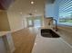 Stainless steel sink with a view of the living room and sliding glass door at 950 20Th St, Orlando, FL 32805