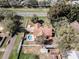 Spacious property boasts a large lot, private pool, and mature trees, offering a serene retreat at 1031 Kings Hwy, Kissimmee, FL 34744