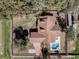 Expansive backyard oasis featuring a sparkling pool, patio, and ample green space, perfect for outdoor living at 1031 Kings Hwy, Kissimmee, FL 34744