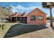 Charming home with a screened porch and lush landscaping at 1031 Kings Hwy, Kissimmee, FL 34744