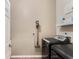 Laundry Room with gray washer and dryer at 1031 Kings Hwy, Kissimmee, FL 34744