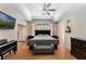 Bright main bedroom with a view to outside and wood flooring at 1031 Kings Hwy, Kissimmee, FL 34744