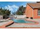 Backyard with large in-ground pool and paver deck for ultimate relaxation and entertaining at 1031 Kings Hwy, Kissimmee, FL 34744
