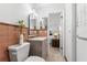 Bathroom with updated vanity and fixtures, tile accents, and a bright, clean design at 1232 Corbett Ln, Orlando, FL 32806