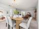 Cozy dining space seamlessly connected to the living room, perfect for entertaining at 1232 Corbett Ln, Orlando, FL 32806