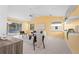 Bright living room offers a vaulted ceiling, sliding glass doors to the pool, and modern decor at 1232 Corbett Ln, Orlando, FL 32806